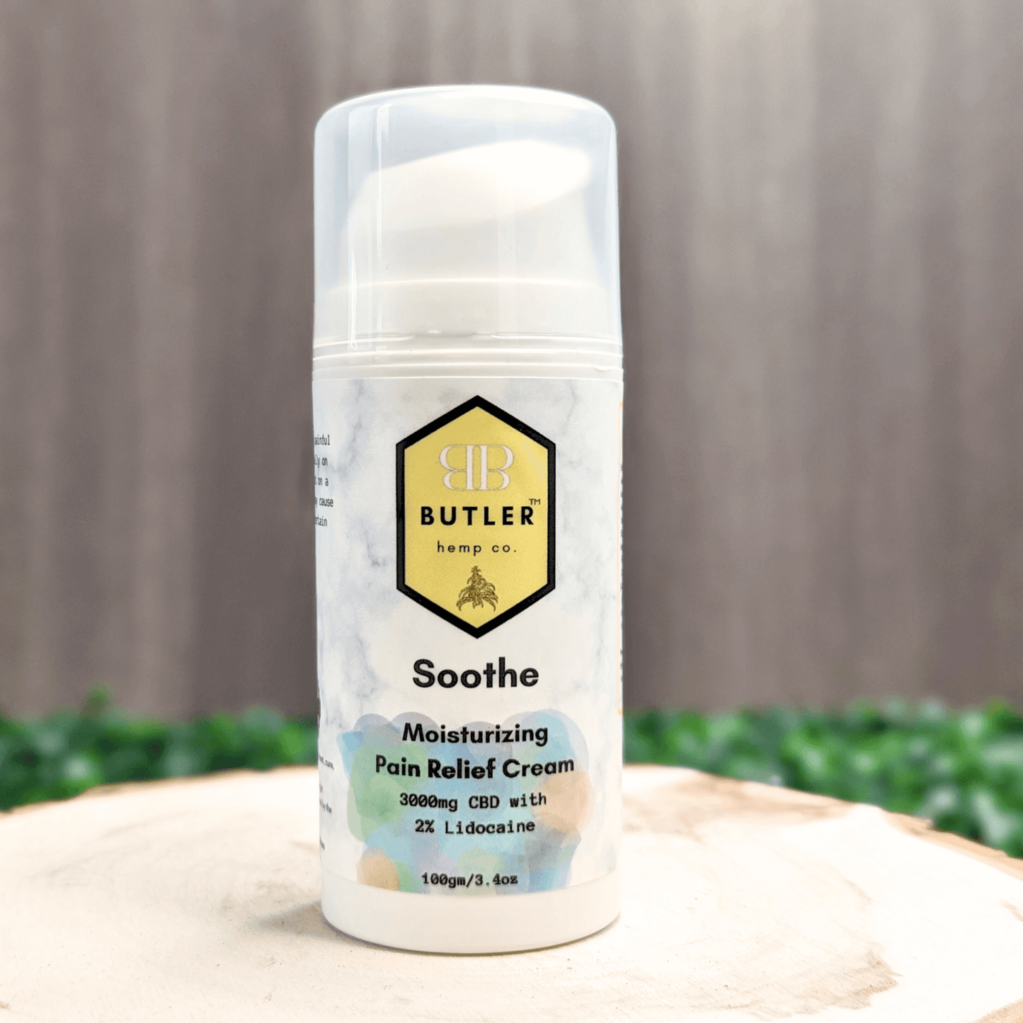 Butler Soothe Relief Cream set on a soft lifestyle backdrop, emphasizing its smooth, hydrating texture and gentle citrus-vanilla scent designed for daily skin comfort and natural-feeling relief on tender joints or sore spots.